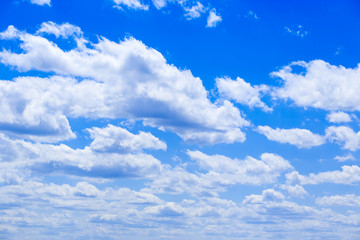 White fluffy clouds in the blue sky