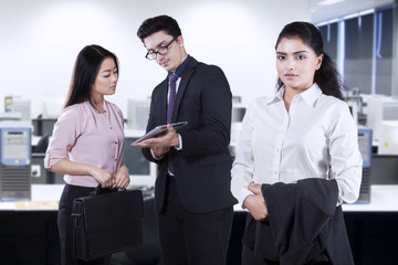 Female business leader with her team