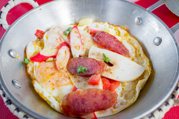 Vietnamese style fried egg in pan.