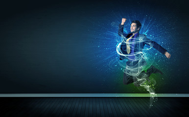 Talented cheerful businessman jumping with glowing energy lines