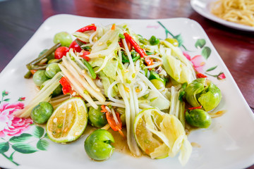 Green papaya salad Thai cuisine spicy delicious,SOM TAM.