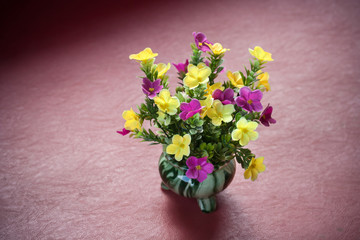 Plastic flower in vase