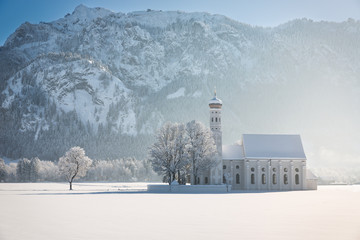 St. Coloman with trees in wintery landscape, Alps, Germany - obrazy, fototapety, plakaty