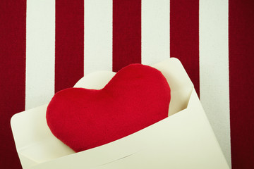 Valentines day background with heart in envelop