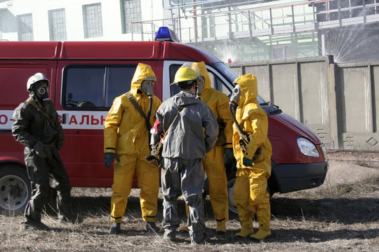 Man in chemical protection suit,