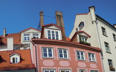 Fototapeta na wymiar Red roofs, dormers and chimneys (Riga, Latvia)