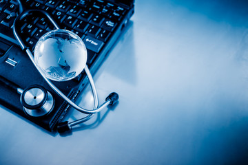 Glass globe and stethoscope