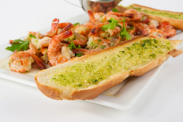 Bread with garlic herb butter and prawns