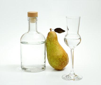 Abate Fetel pear with alcohol bottle and glass