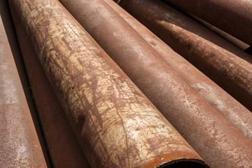 Rusty metal pipes stack