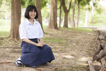 Girl sitting and smiling