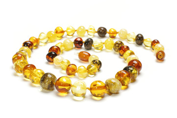 Stylish various colors amber necklace isolated