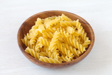 Italian Macaroni Pasta raw food on wood table