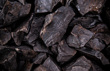 Coal lumps on dark background