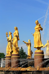Fototapeta na wymiar Fountain with sculptures of girls (detail)