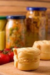 Rolled steamed cheese Parenica on wooden board