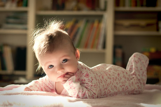 Beautiful Baby Lying On Tummy