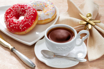 Hot tea with delicious doughnut
