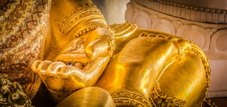 Closeup of the hand of buddha's image .