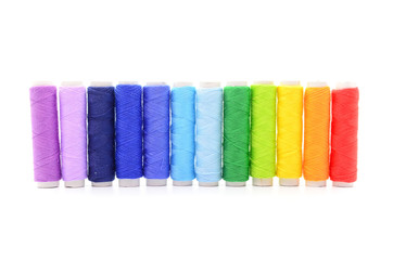 Set of colorful spools of thread