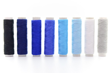 Set of colorful spools of thread