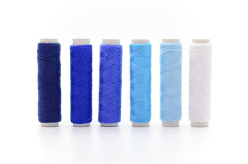 Set of colorful spools of thread