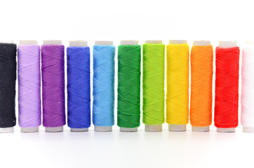 Set of colorful spools of thread