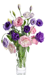 beautiful bouquet of  eustoma flowers in glass vase