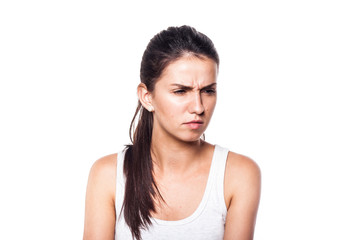 Attentive and concentrated young girl on white