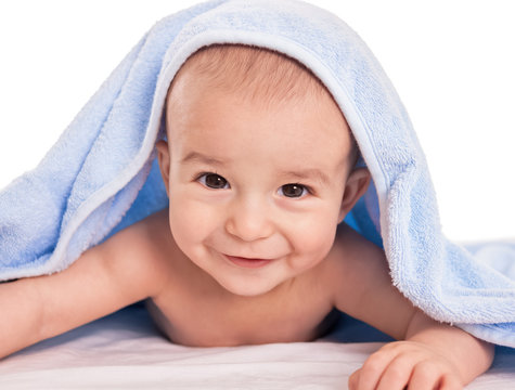 Funny smiling baby after bathing