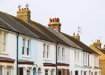 Mainly white terrace houses in a row