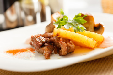 meat with potatoes and mushrooms
