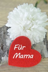 Obraz na płótnie Canvas Blume mit Herz für Mama zum Muttertag