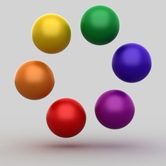 colorful glossy balls on gray