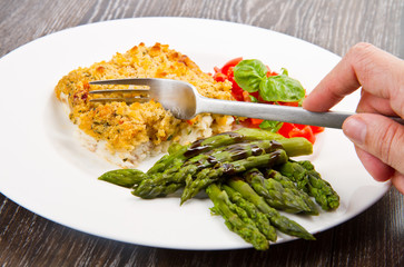 cod fish with crispy breadcrumbs and asparagus