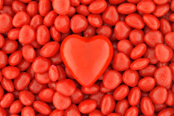 Obraz premium One Big Candy Heart in the Middle on Small Valentine Candies