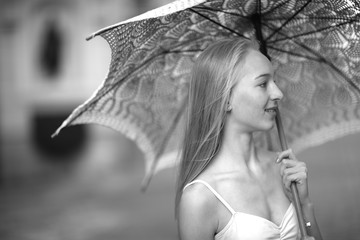 Beautiful  woman portrait with a knitted umbrella