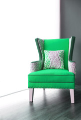 Modern green fabric armchair
