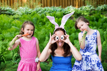 Funny Mother with Children Wearing Bunny Ears and Silly Eyes