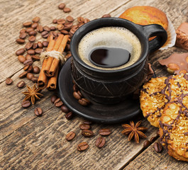 coffee and cookies on wood background