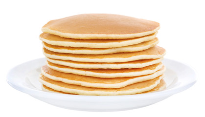 Stack of delicious pancakes on plate isolated on white