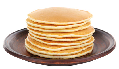 Stack of delicious pancakes on plate isolated on white