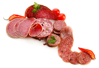 Various sliced salami with chili pepper, cherry tomatoes and