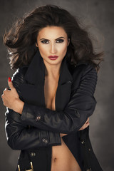 Fashion shot of a woman in black coat