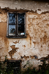 Background - an old wooden window on the whitewashed walls were