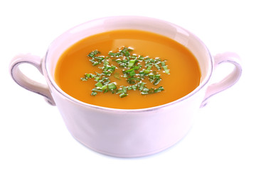 Carrot soup isolated on white