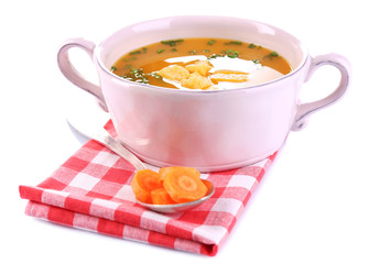 Carrot soup isolated on white