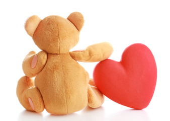 Teddy Bear with red heart isolated on white