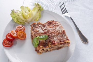 serving a lasagna on a plate