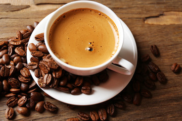 Cup of coffee on wooden table